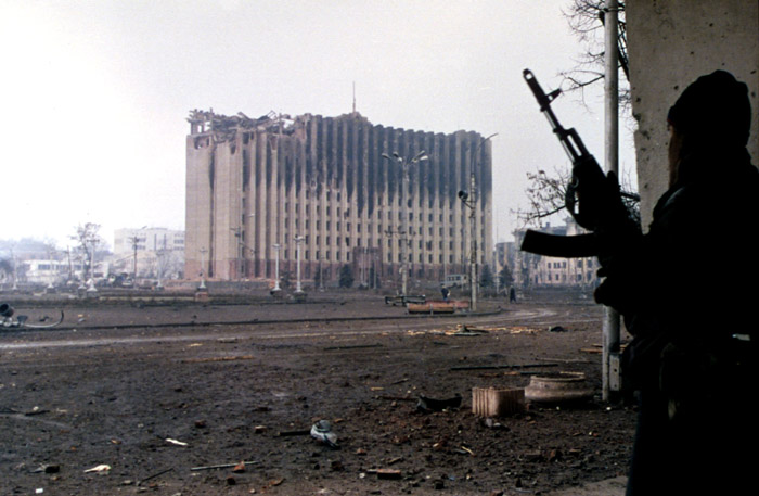 A Chechen fighter near the government palace during a lull in fighting, Grozny, January 1995